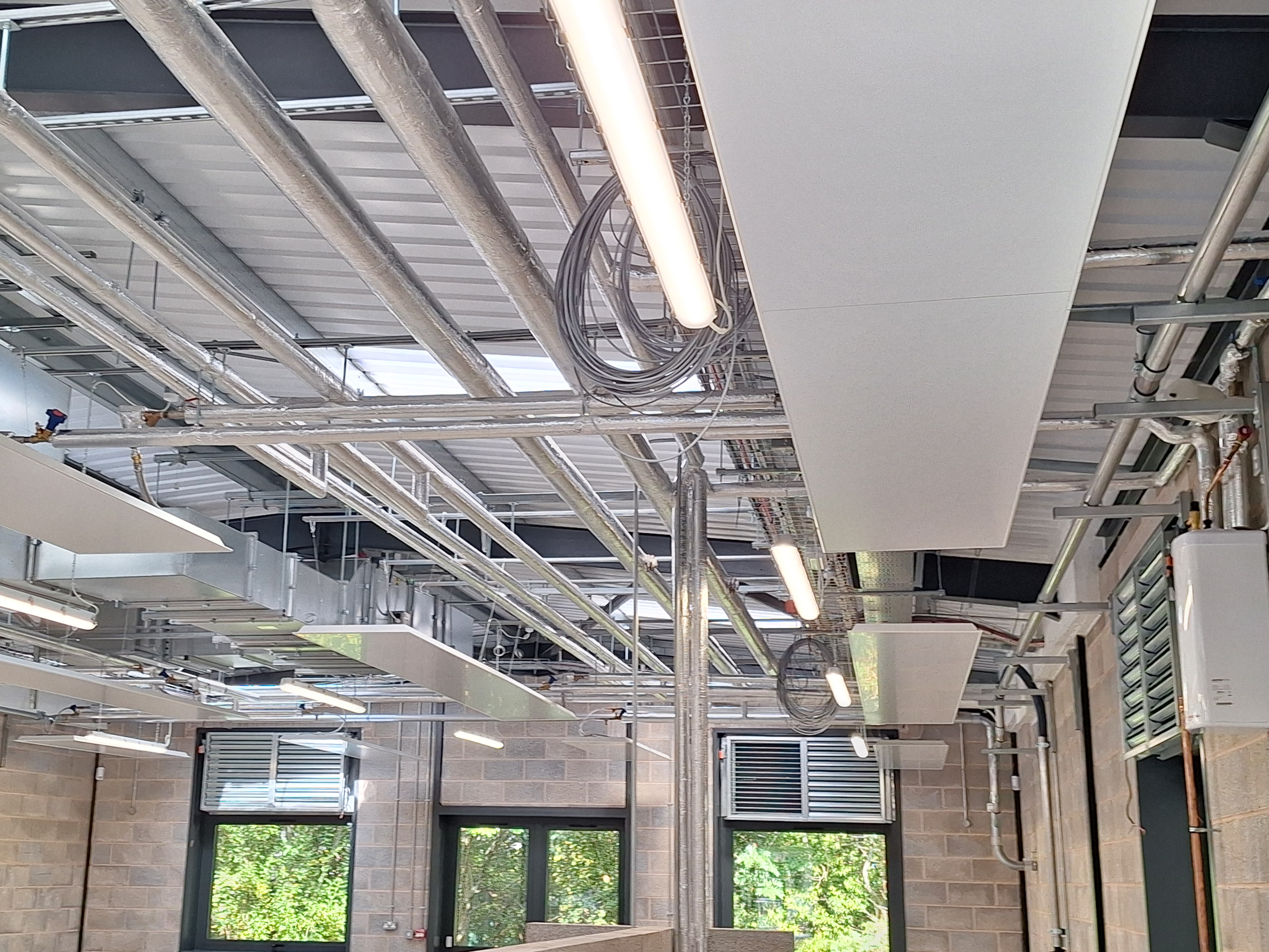Free-hanging Thermatile radiant panels at Manchester College Wythenshawe